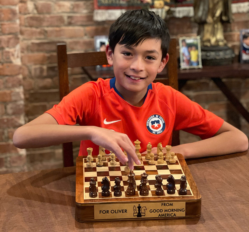 Oliver practices on the chess board that was gifted to him by Good Morning America during his appearance on the show. December, 2020